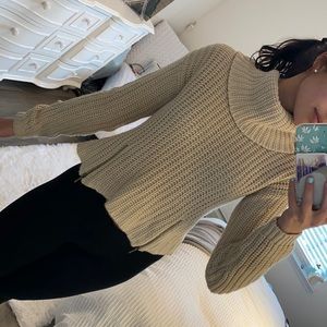Cream sweater with turtle neck and zipper